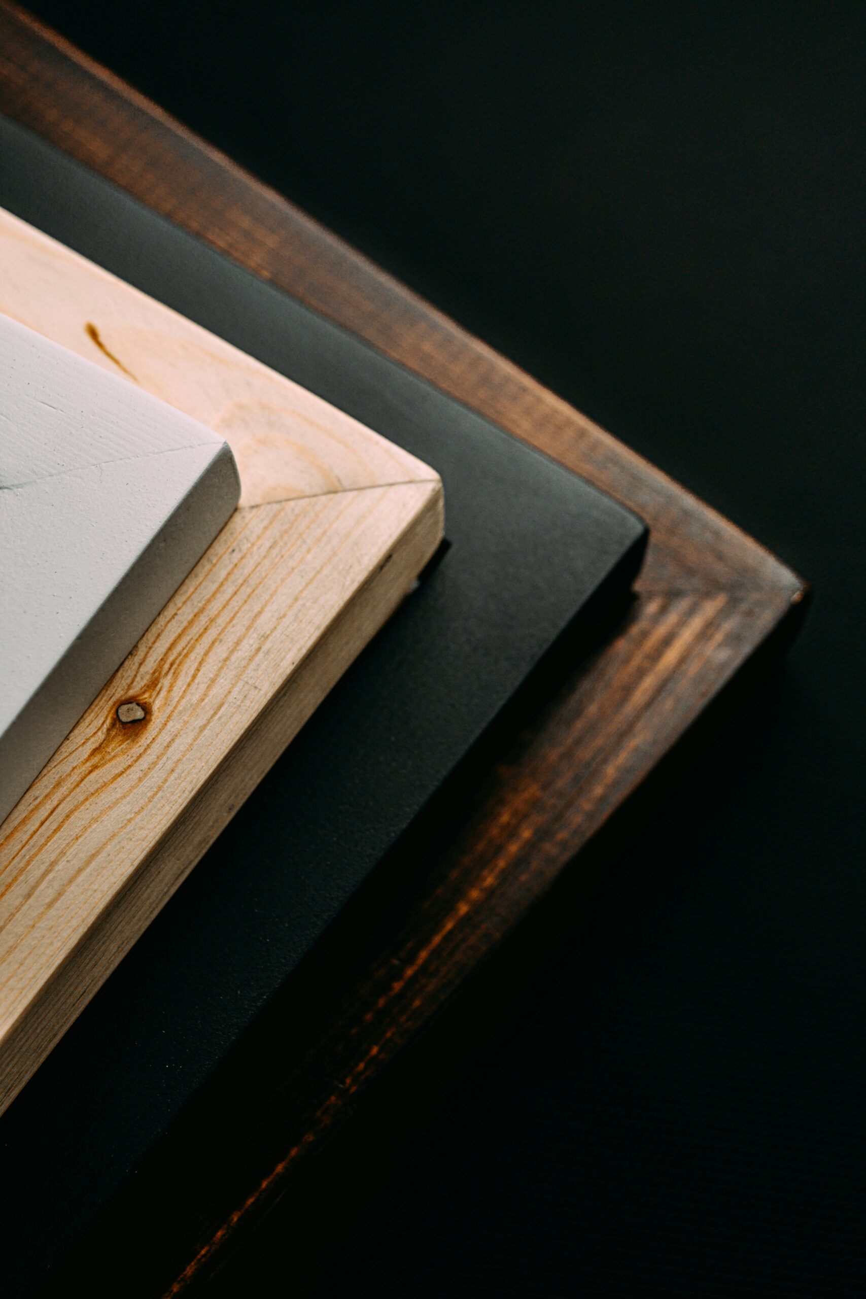 Interior design material samples including textures, finishes, and color swatches.