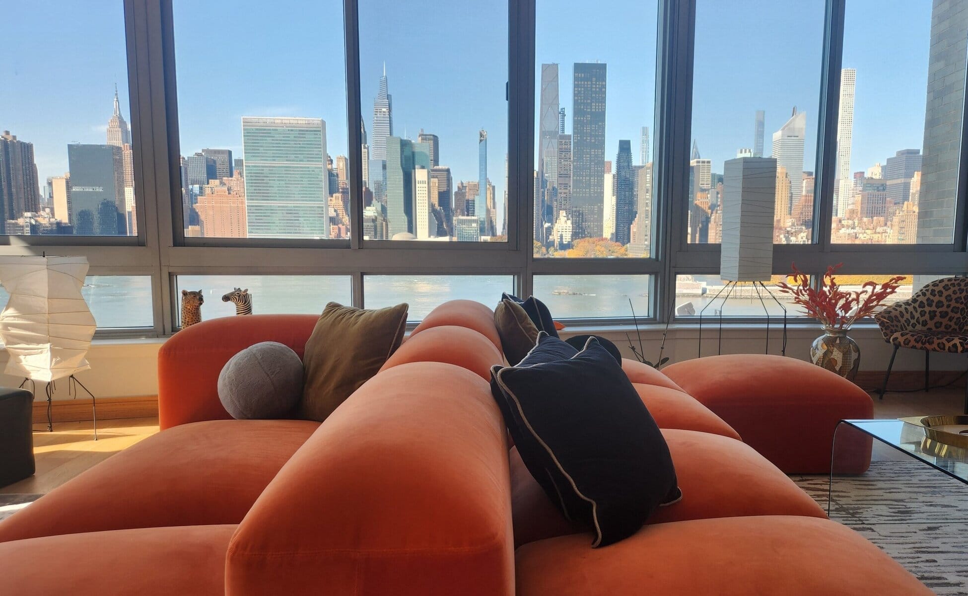 Modern French Touch apartment with elegant décor, NYC skyline, and the Pepsi sign in Long Island City.