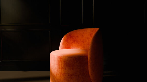 French Chic Certified Interior Stylist & Decorator Course presentation featuring an orange armchair on a dark background.